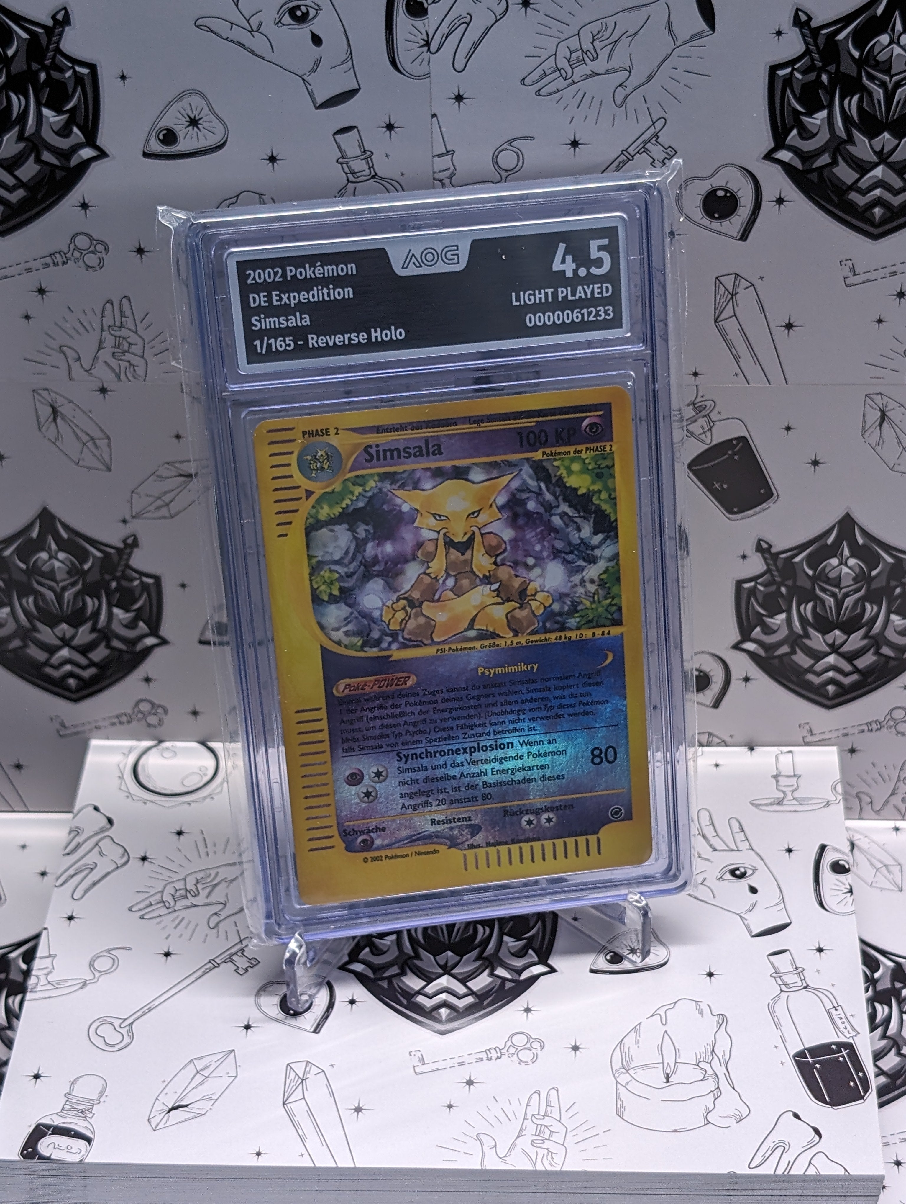 AOG Graded 4.5 - 2002 Pokémon – Expedition – DE Simsala 1/165 Reverse Holo